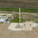 This photo taken June 24, 2014 shows an ICBM launch site is located among fields in the countryside outside Minot, N.D. Launch control officers working from a remote underground facility control Minuteman 3 missiles carrying nuclear warheads housed in the launch sites as part of the US nuclear defense strategy. (AP Photo/Charlie Riedel)